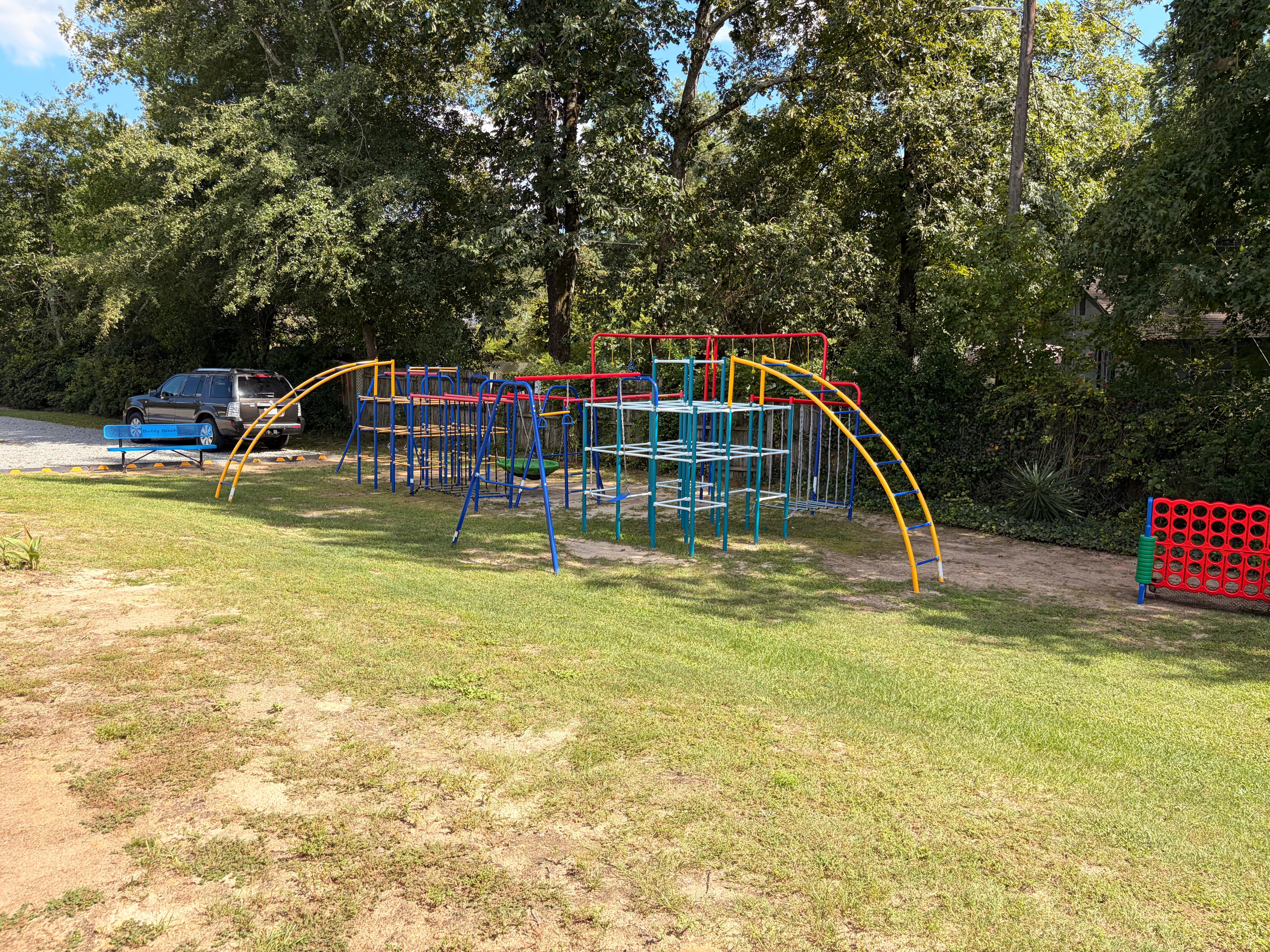 The outdoor playground on Action Zone's two acres, where siblings play during class